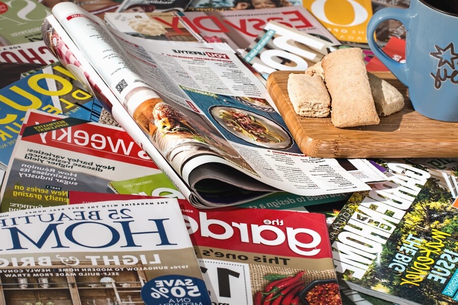 What type of newspapers not to compost?